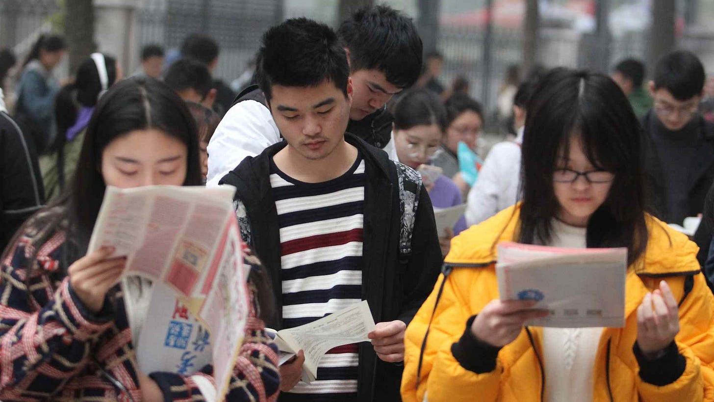 Nearly 1 million sit for China's civil service exam - CGTN