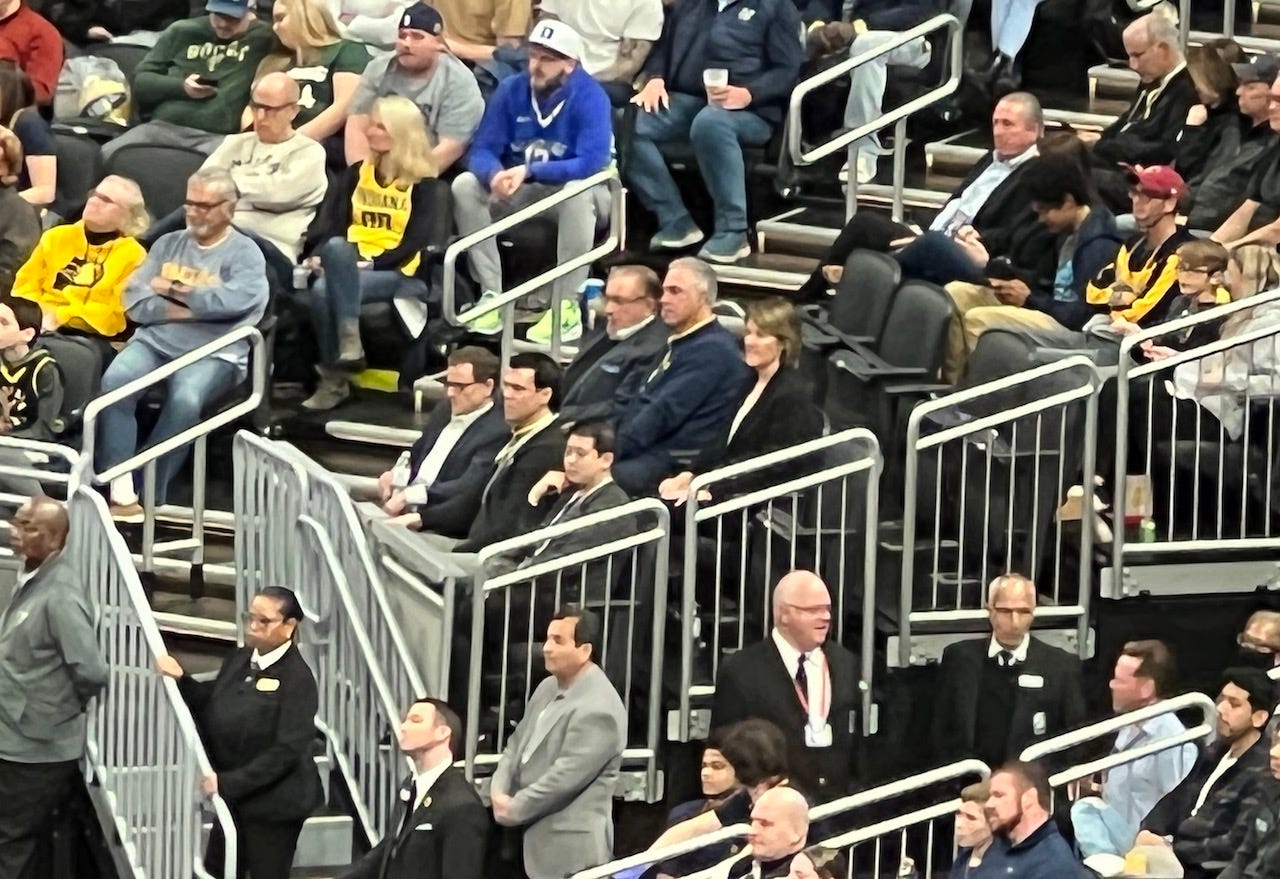 Pacers ownership (Herb and Steve Simon) and the front office at a home game.