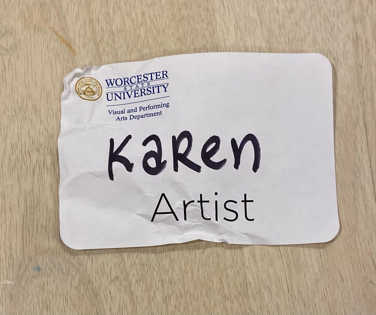 name tag reads, Karen, Artist