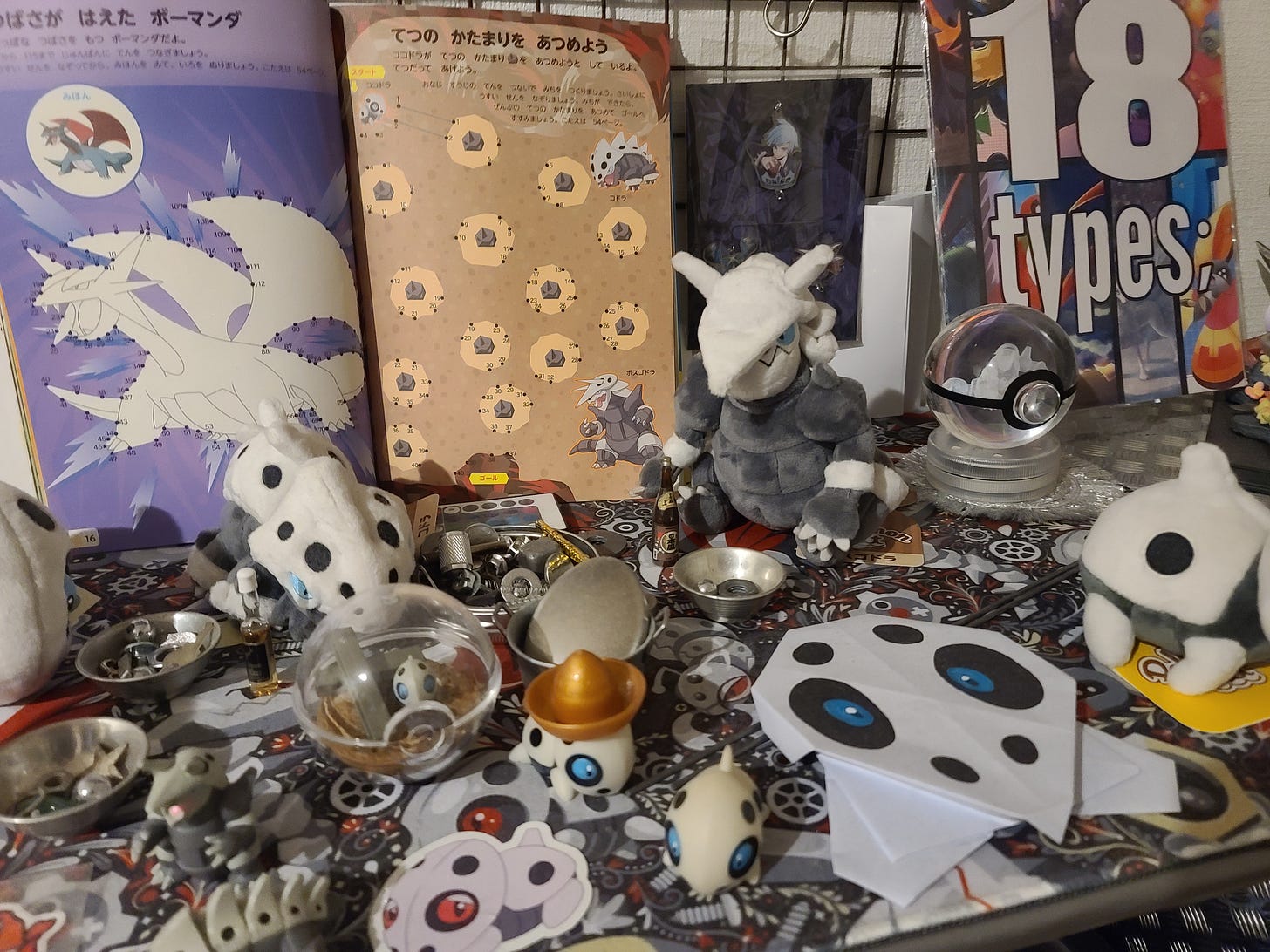 SteC’s display features the entire Aron evolution line, including Lairon and Aggron. It’s even decorated with metal objects, such as bolts and springs, to complement the presentation of Steel-type Pokémon SteC’s display features the entire Aron evolution line, including Lairon and Aggron. It’s even decorated with metal objects, such as bolts and springs, to complement the presentation of Steel-type Pokémon