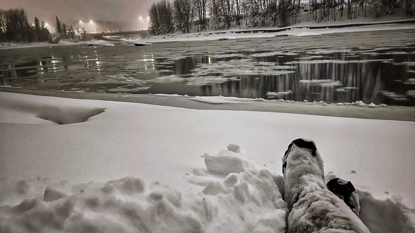 snowy river at night