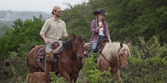 Walker Cordell and Stella riding horsesback together.