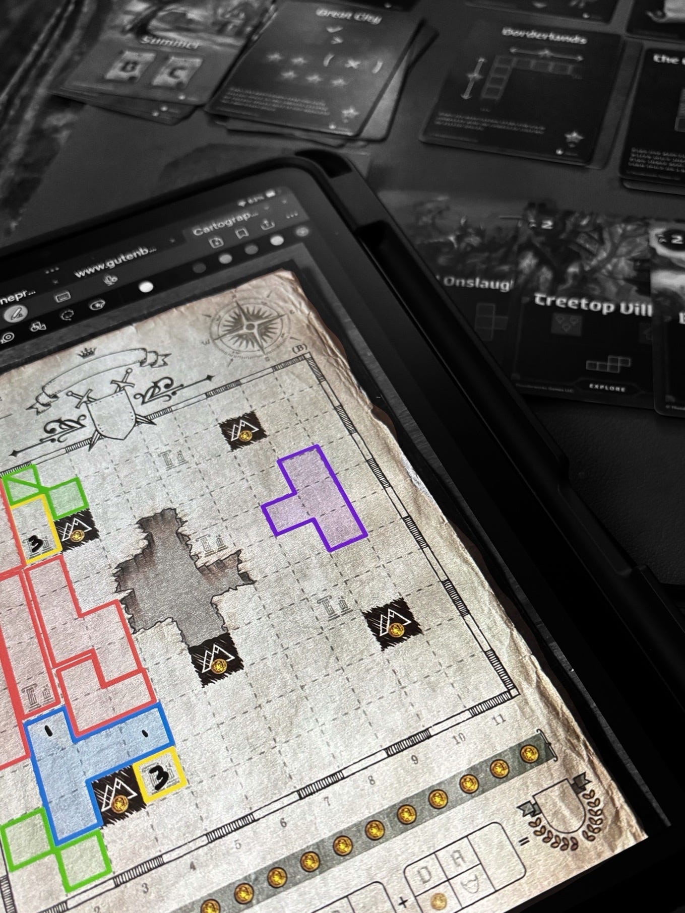 A game of cartographers being played with the score sheet on an ipad