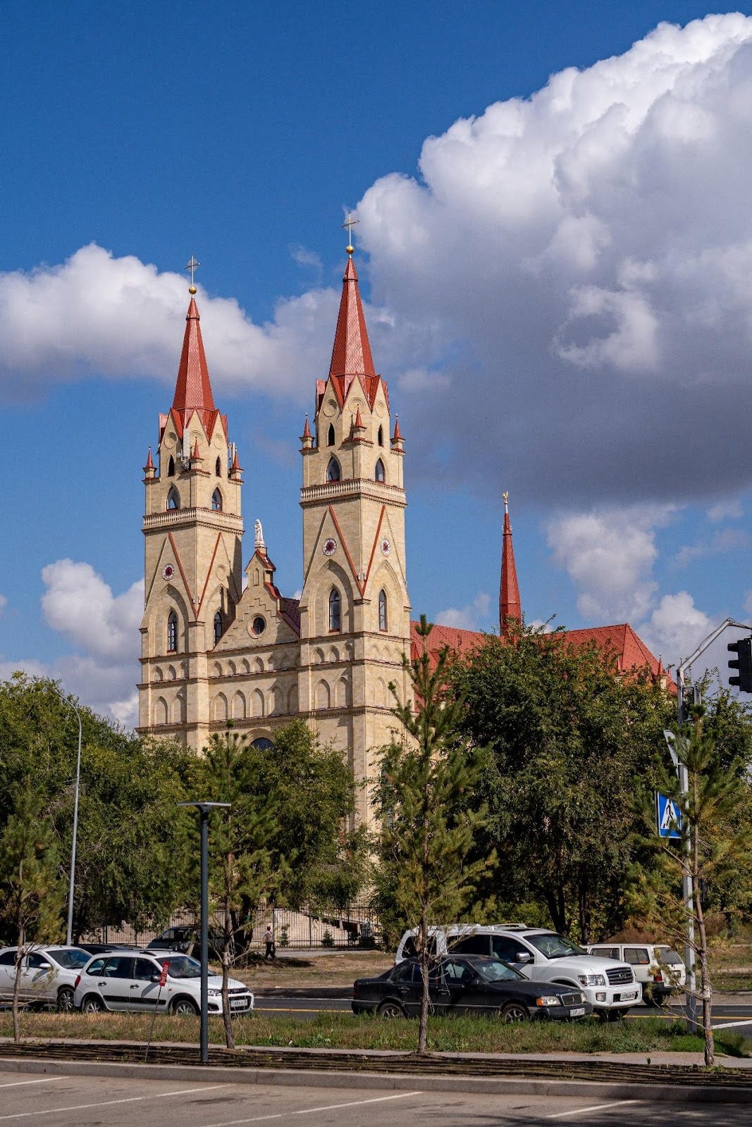 A church with a red roof

Description automatically generated