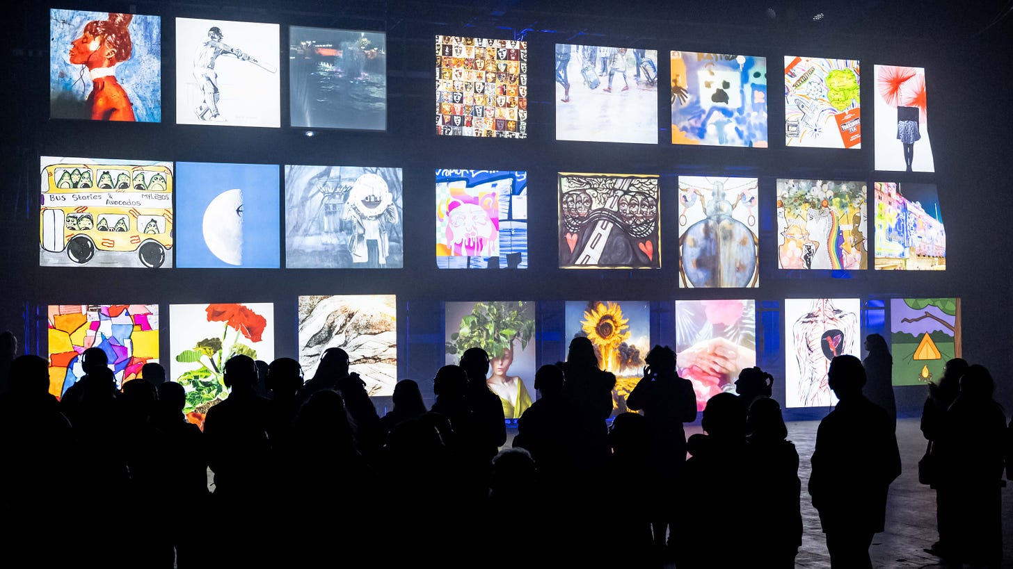 Dark figures stare at multiple screens displaying varied artworks created by Leeds residents.