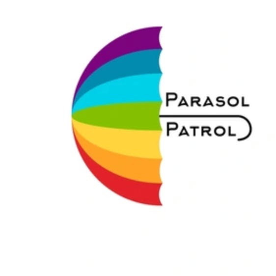 A rainbow-colored umbrella with the name, “Parasol Patrol” straddling the umbrella handle.
