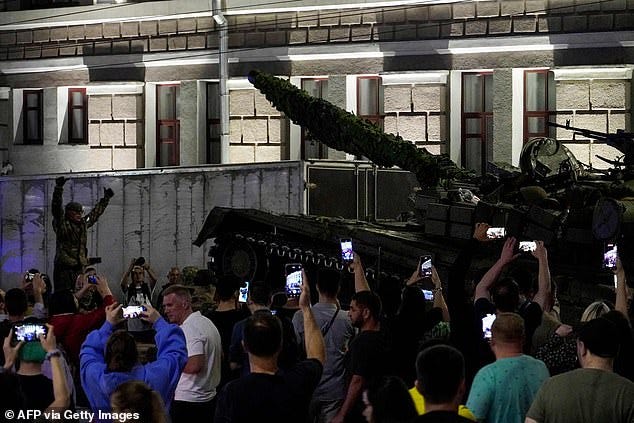 Members of Wagner group prepare to pull out from the headquarters of the Southern Military District to return to their base in Rostov-on-Don late on June 24, 2023