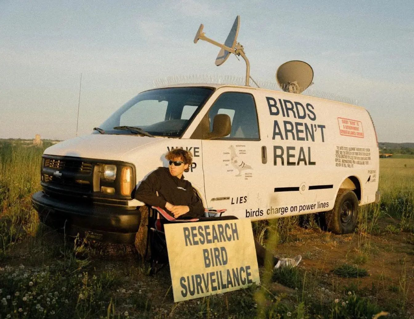 Birds Aren't Real founding member with van 