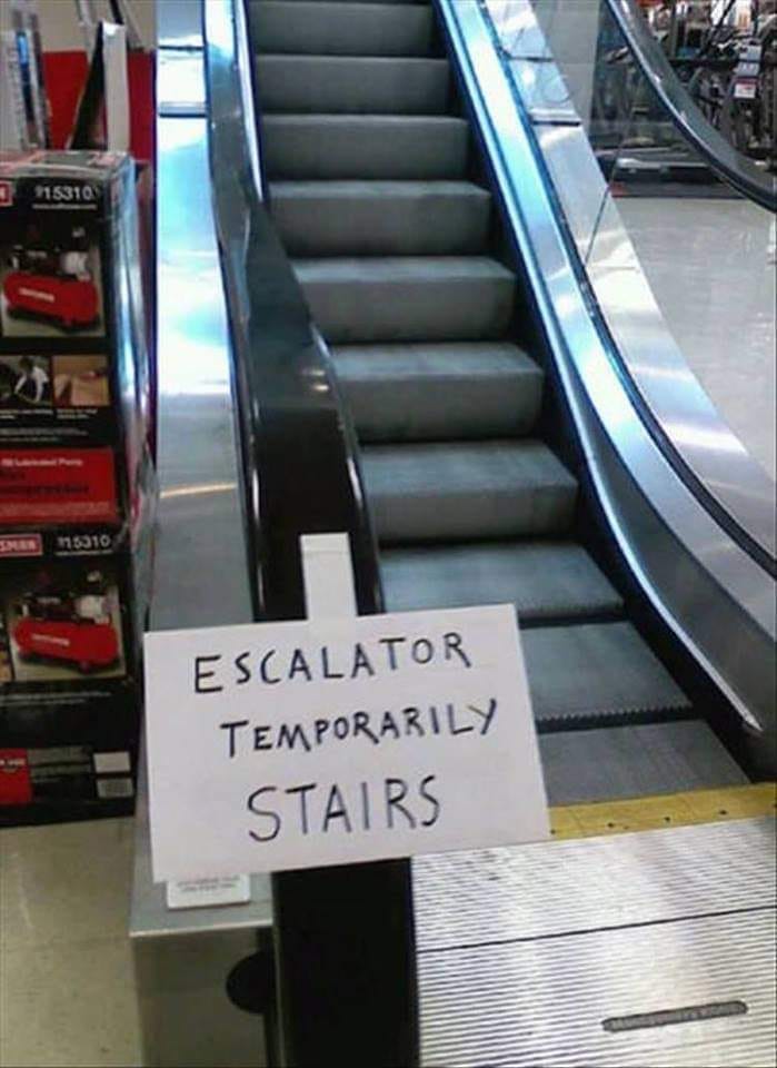 May be an image of text that says 'n ESCALATOR TEMPORARILY STAIRS'