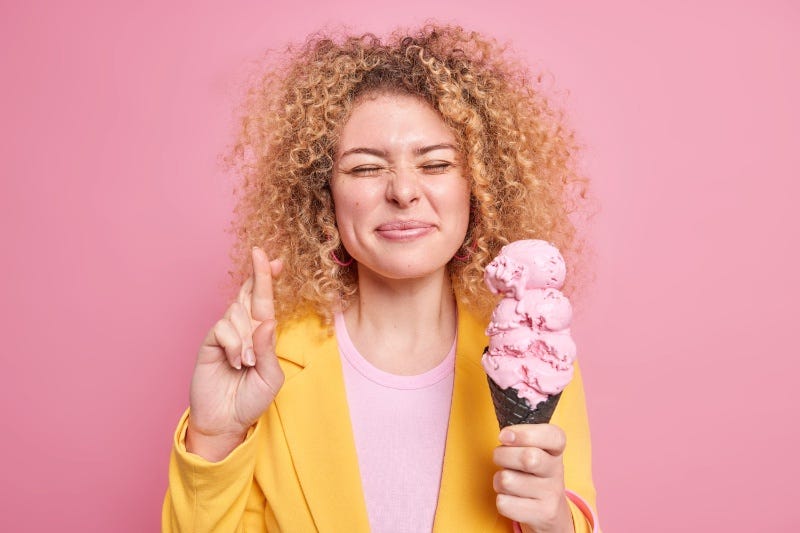 a woman enjoying a delicious ice cream