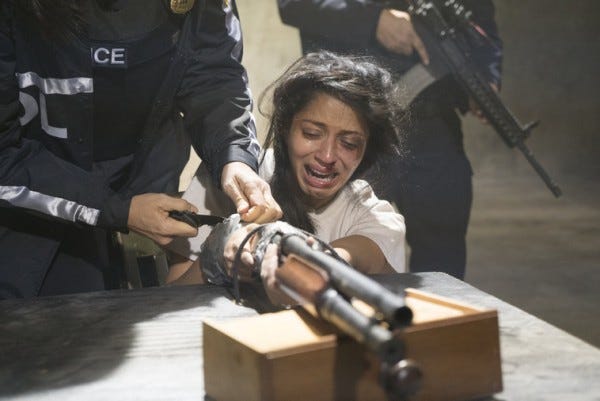 reyna with gun taped to hands on law and order svu 2015 images