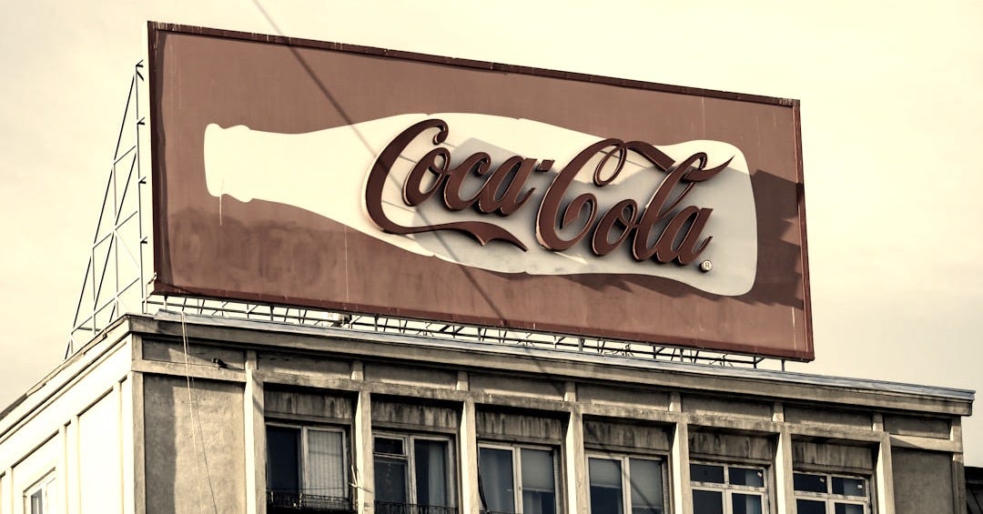 architectural photography of Coca-Cola tarpaulin