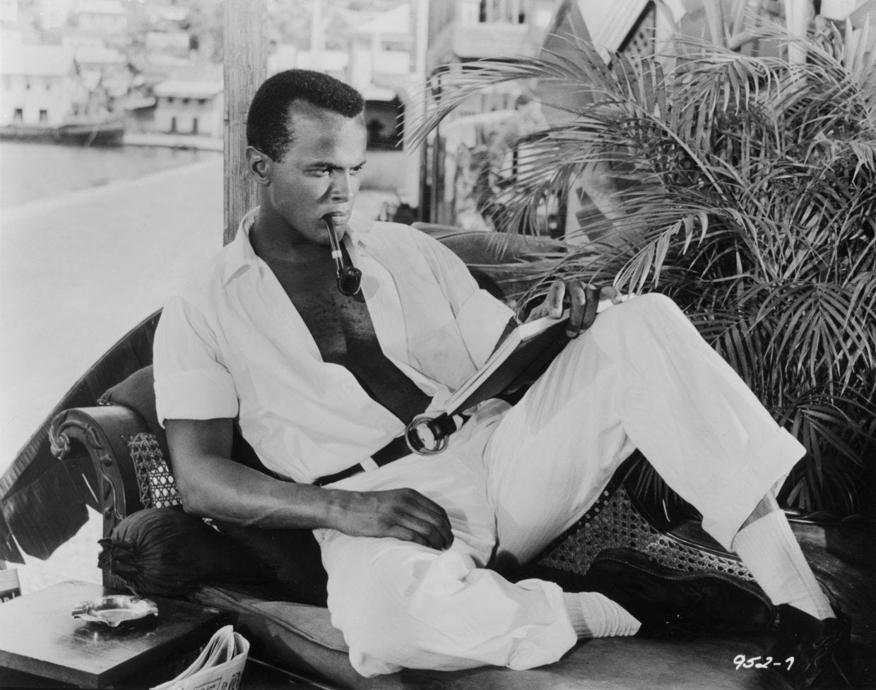 Harry Belafonte reads a book in "Island in the Sun" (1957)