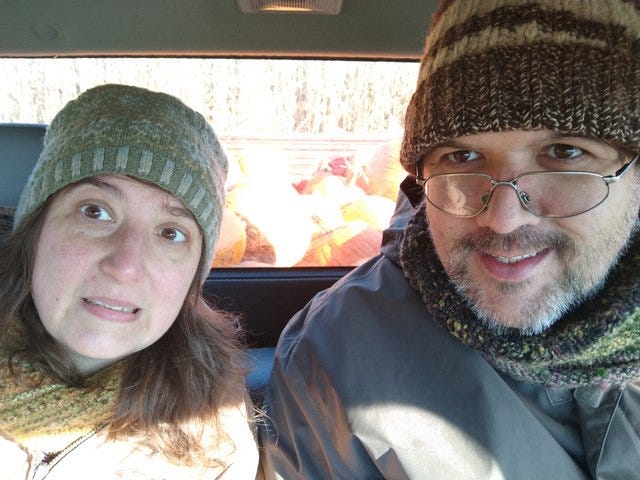 us in a truck full of pumpkins