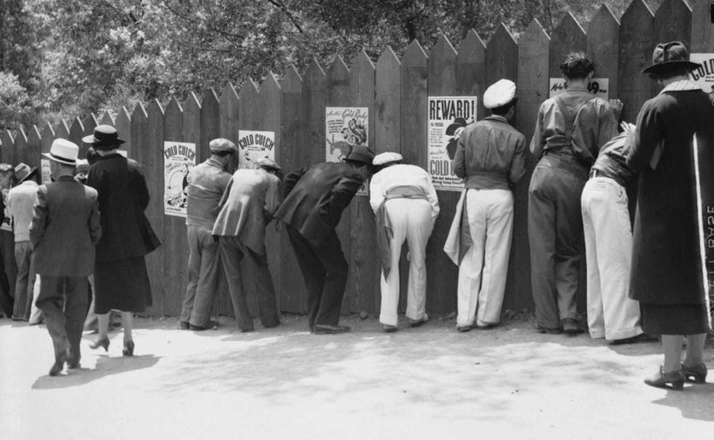 Spectators peek through holes in the fence surrounding nudists at Zoro Garden, 1935 | San Diego History Center Spectators peek through holes in the fence surrounding nudists at Zoro Garden, 1935 | San Diego History Center