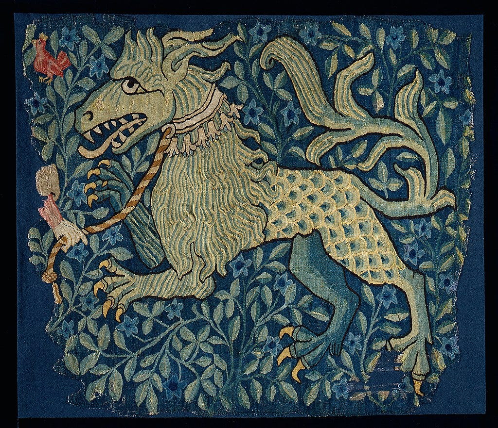 Tapestry of a dragon in blue, green, ad gold.