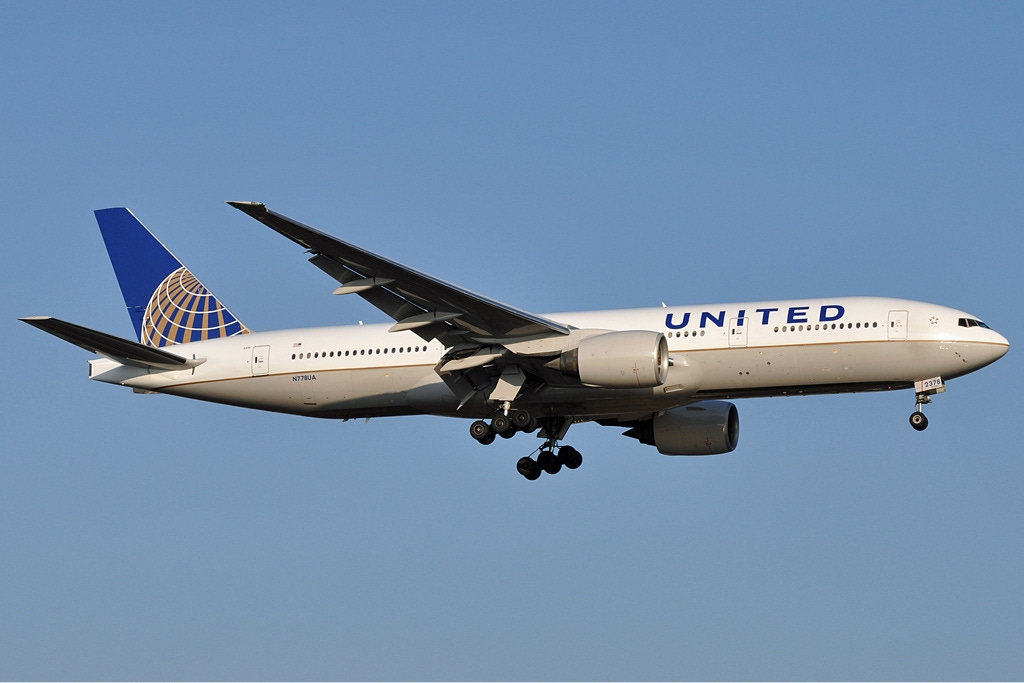 United Airways plane flying through a clear blue sky...for now. (Photo from Wikipedia)