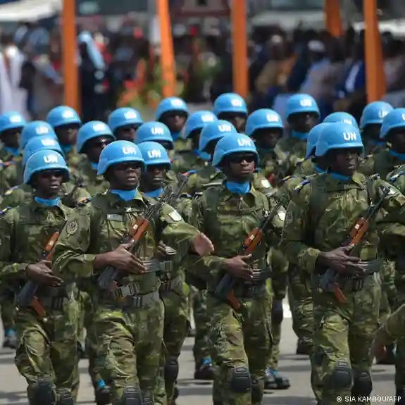 UN peacekeepers marching.