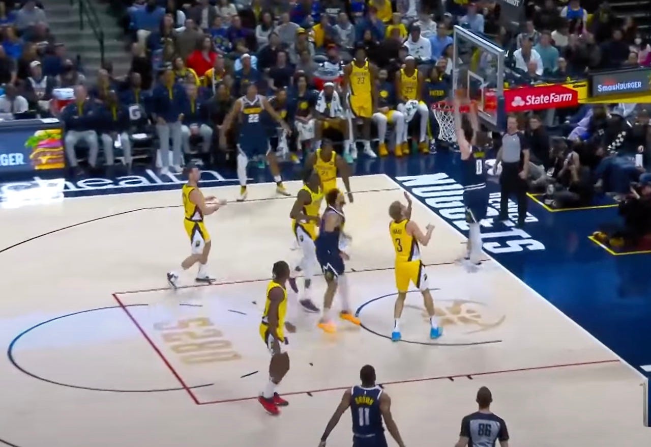 The first of three straight dunks on the Pacers in the third quarter by the Nuggets. They had 16 on the night.
