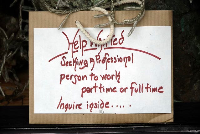 Help Wanted sign.