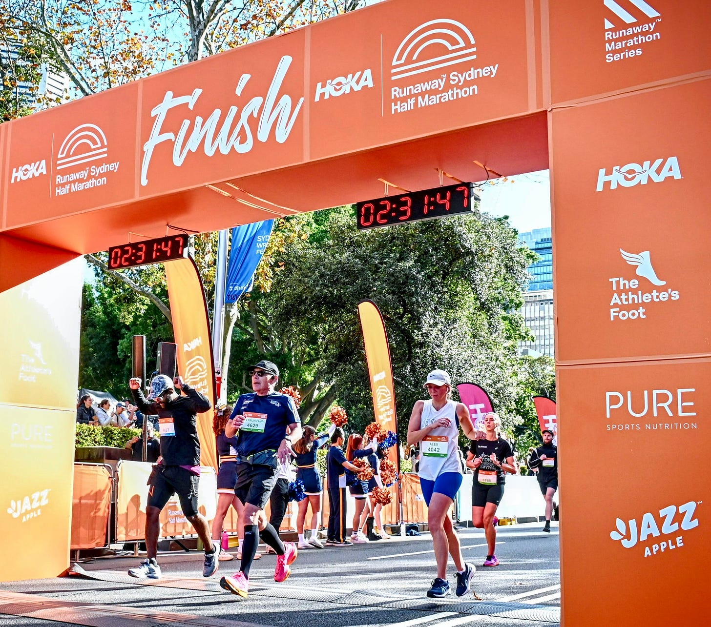 HOKA Runaway Sydney Half Marathon, runners crossing finish line