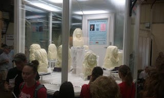 Looking into the glass room that is kept cold where the butter bust sculptures are created and stored in the dairy building at the minnesota state fair.