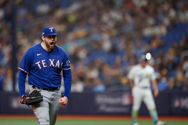 Jordan Montgomery of the Texas Rangers celebrates a strikeout during Game One of the Wild Card Series against the Tampa Bay Rays at Tropicana Field...