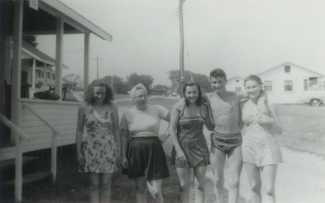 Five people in swimming attire