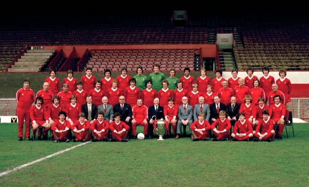 Liverpool FC players and officials line up for a team photograph with the European Cup at Anfield in Liverpool, England, circa July 1978. Back row :...