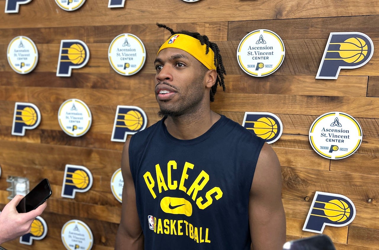 Pacers guard Buddy Hield talks with local reporters.