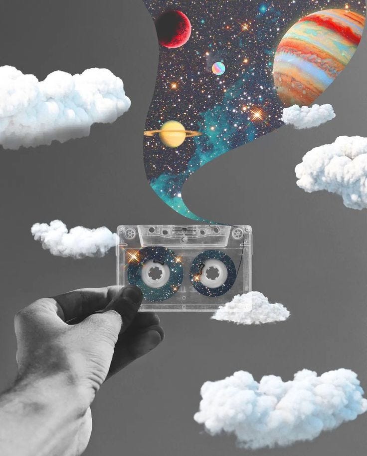 This may contain: a hand holding an old cassette in the air with planets and stars floating around it