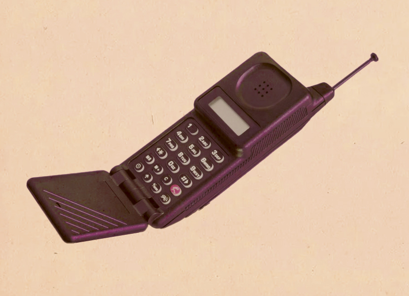 Descrição da imagem: um celular de flip dos anos 90.