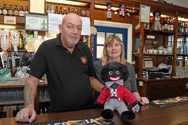 Gollies race row landlady defies police by putting dolls back on display in  pub - Daily Record