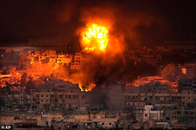 Flames rise after an Israeli airstrike in the southern suburbs of Beirut, Lebanon on Sept 28