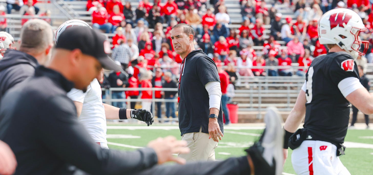Wisconsin Badgers head football coach Luke Fickell walks onto the field at the Spring Showcase