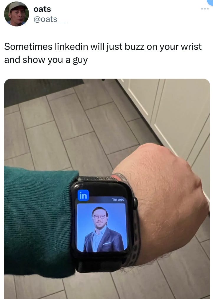 Tweet from @oats___ sometimes linked will just buzz on your wrist and show you a guy. Image is an Apple Watch on a man’s wrist and on it is a picture of a smiling man in a suit from LinkedIn