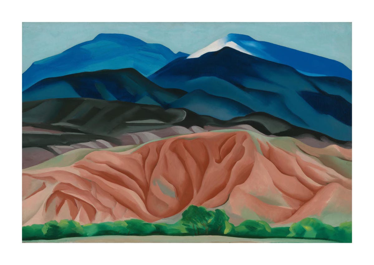 Horizontal landscape with blue peaks in the background, black and pure ground. Along the bottom edge is a strip of green foliage and trees. Horizontal landscape with blue peaks in the background, black and pure ground. Along the bottom edge is a strip of green foliage and trees.