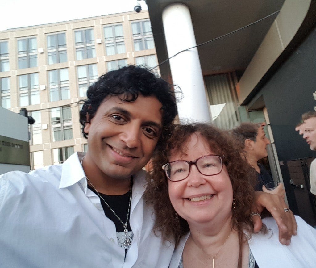 m night shyamalan with movie tv tech geeks lynn zubernis