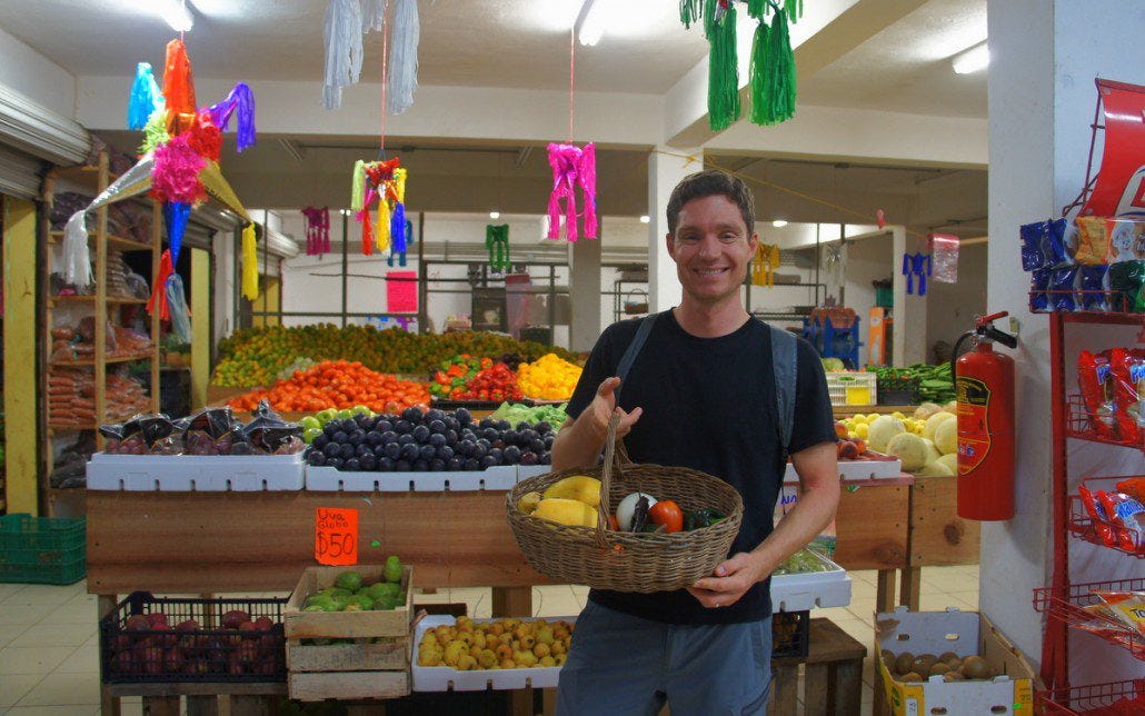 Practicing my Spanish and picking up fruit for a dessert salad.