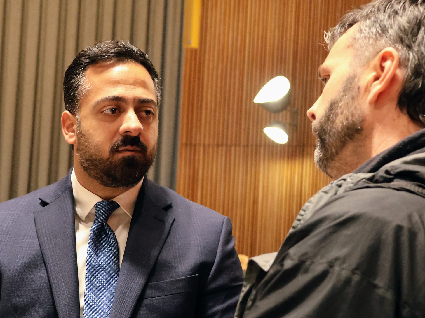 Qais Kasab, of the Palestine Mission, speaks to journalists inside the UN during the Second Meeting of States Parties to the TPNW (Credit: Dr Becky Alexis-Martin for Lex International's Spoiler Alert)