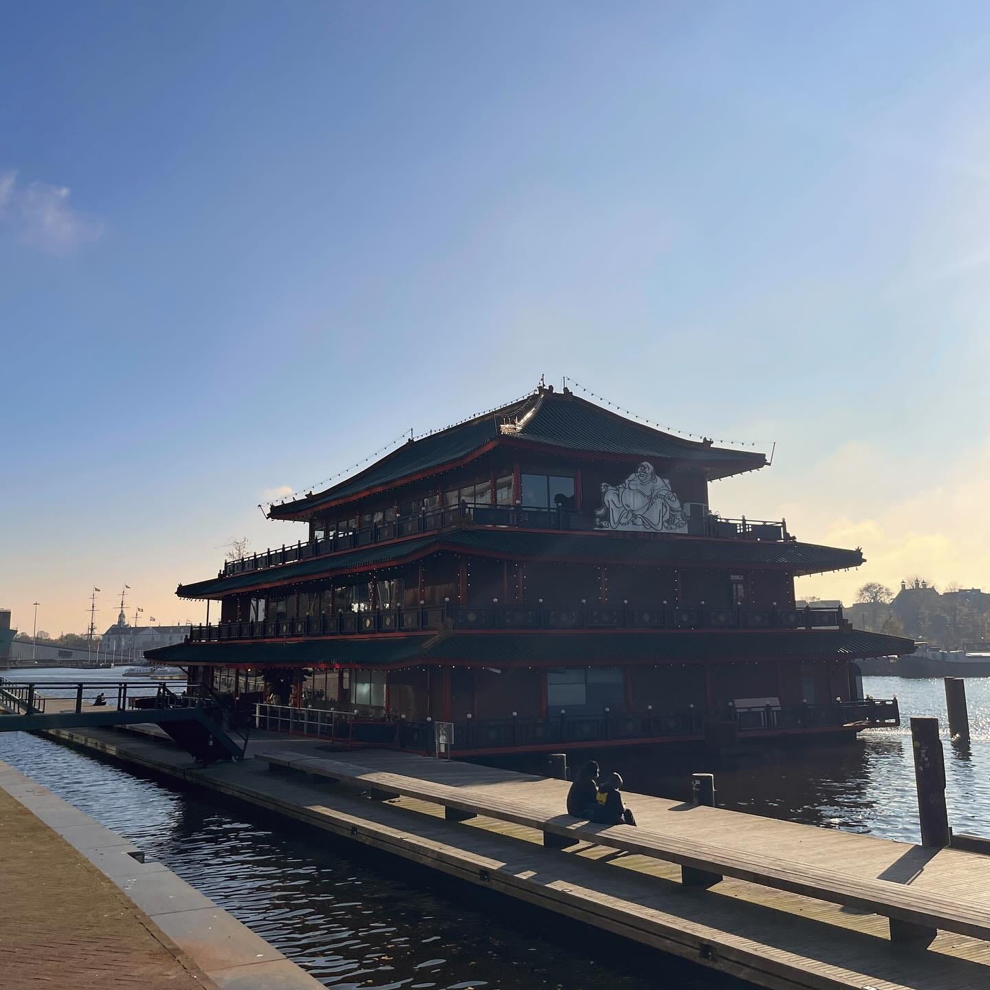  Floating Restaurant on the canal in Amsterdam. It is Chinese inspired architecture. The restaurant is called the Sea Palace.