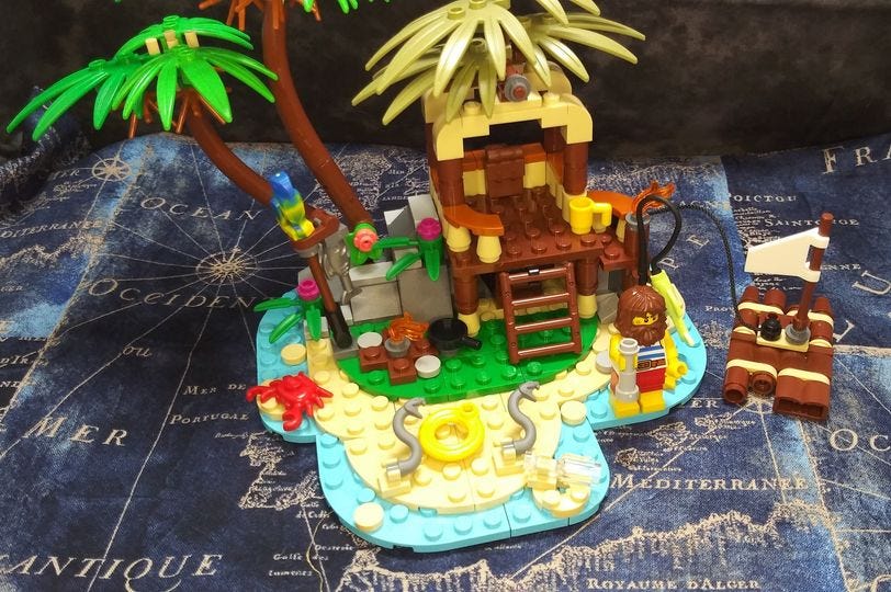 May be an image of lego, palm trees and text