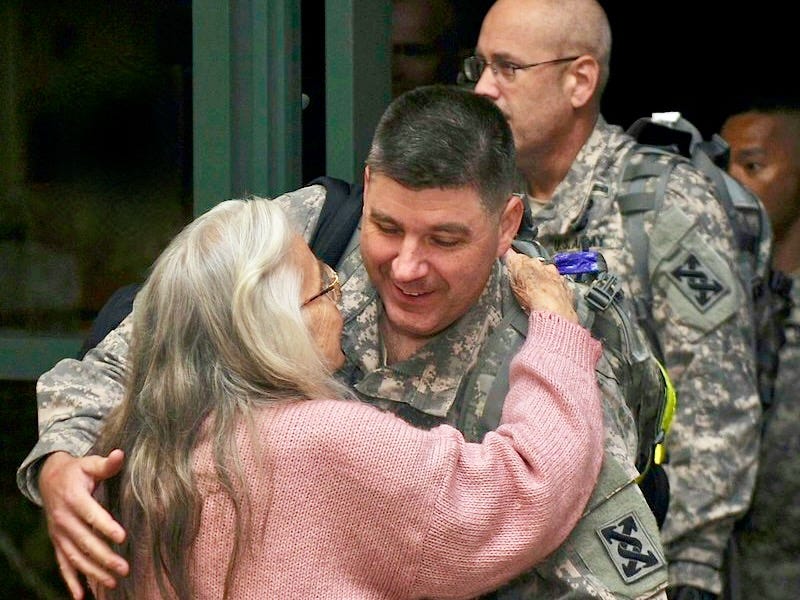 Elizabeth Laird, The Hug Lady, hugging Fort Hood soliders