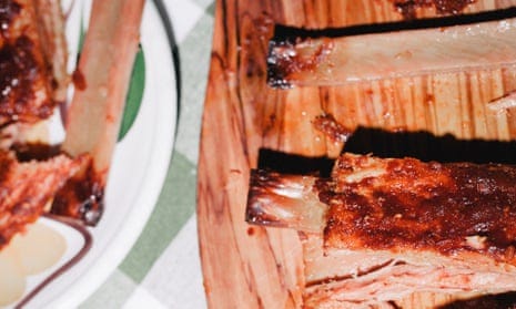 Close-up of plant-based ribs on a serving board and plate