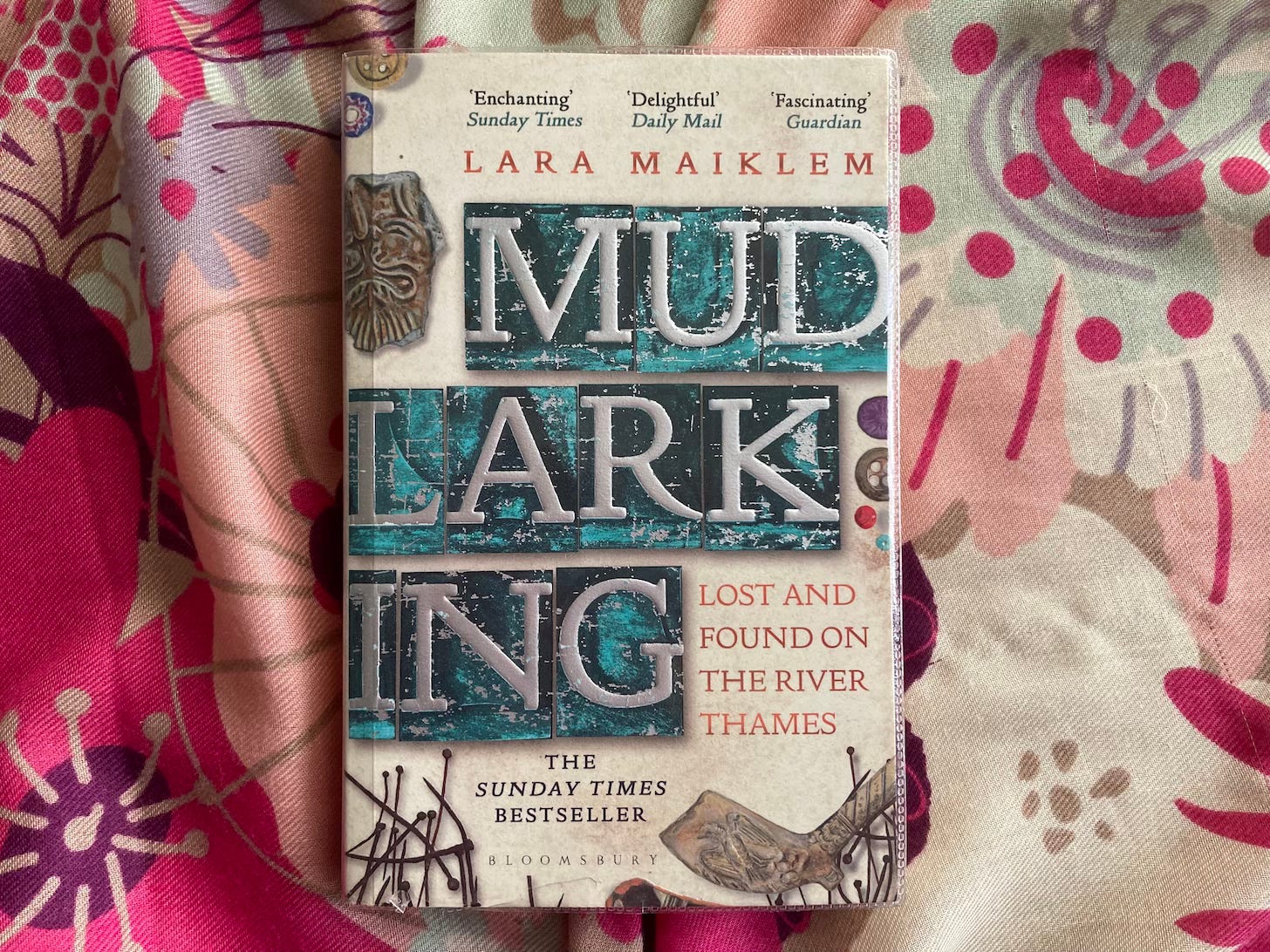 Mudlarking book by Lara Maiklem with subtitle Lost and Found on the River Thames photo taken by Yasmin Chopin for Substack publication Place Writing.