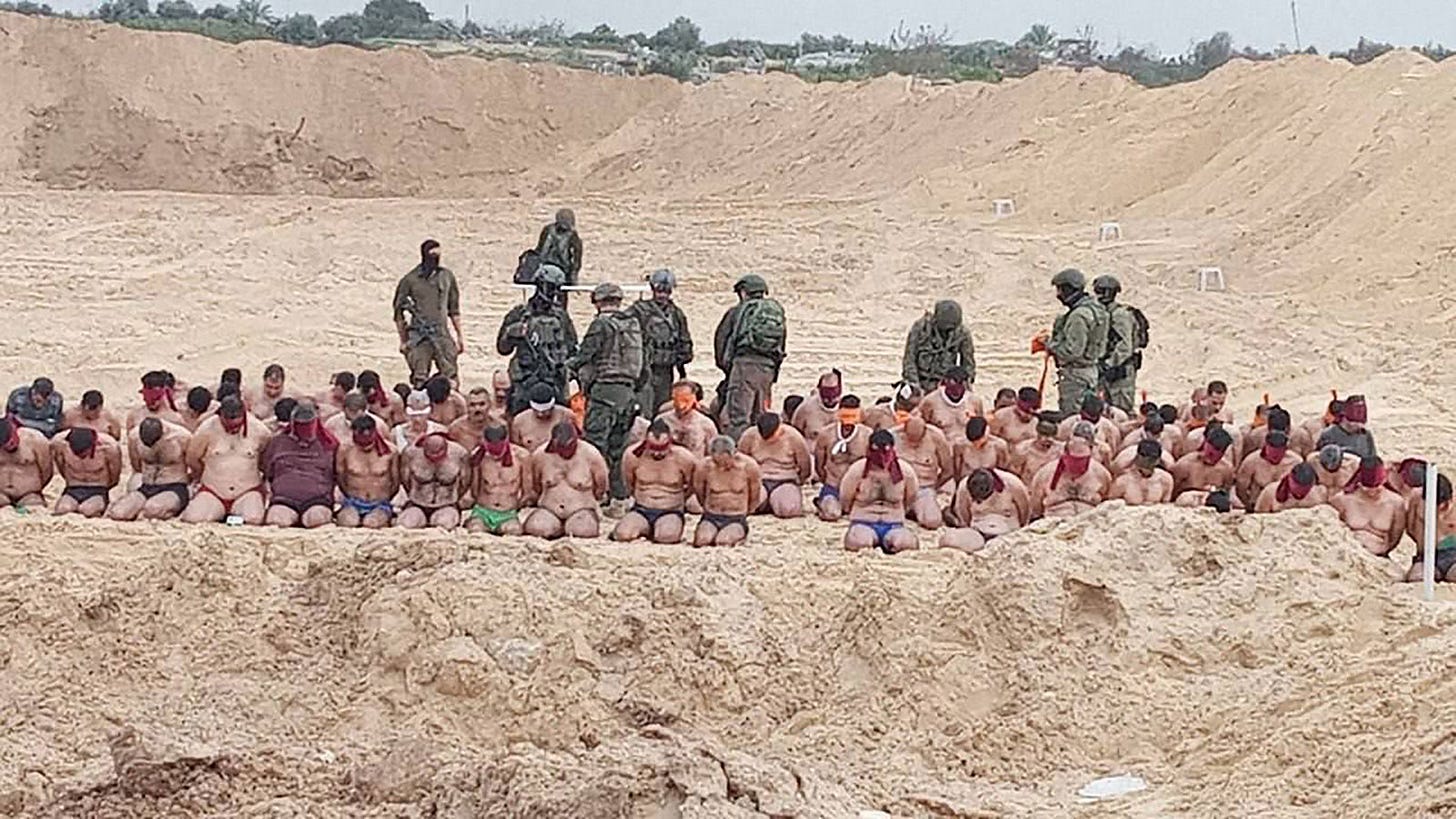 Images from Gaza show Israeli soldiers detaining dozens of men stripped ...