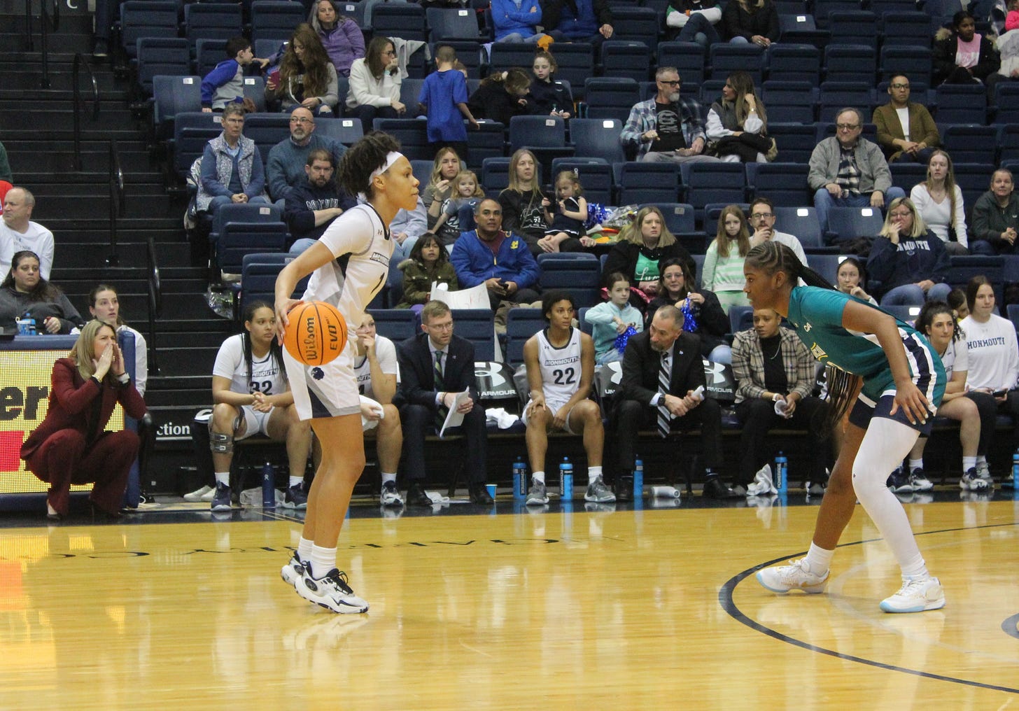 Monmouth guard Ariana Vanderhoop handles the ball during a 65-53 win over UNC Wilmington on March 9, 2024. (Photo by Adam Zielonka)