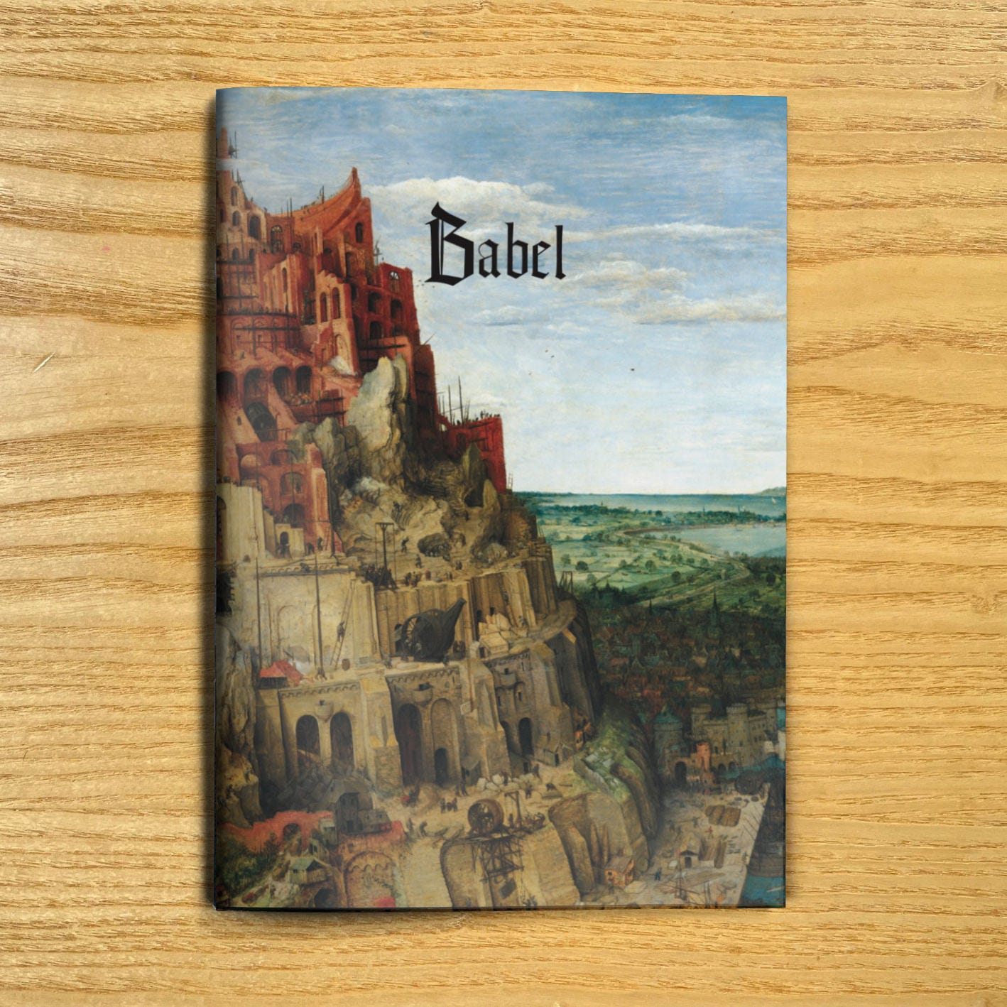 An image of the Babel game. The cover features “The Tower of Bable” by Pieter Bruegel the Elder.