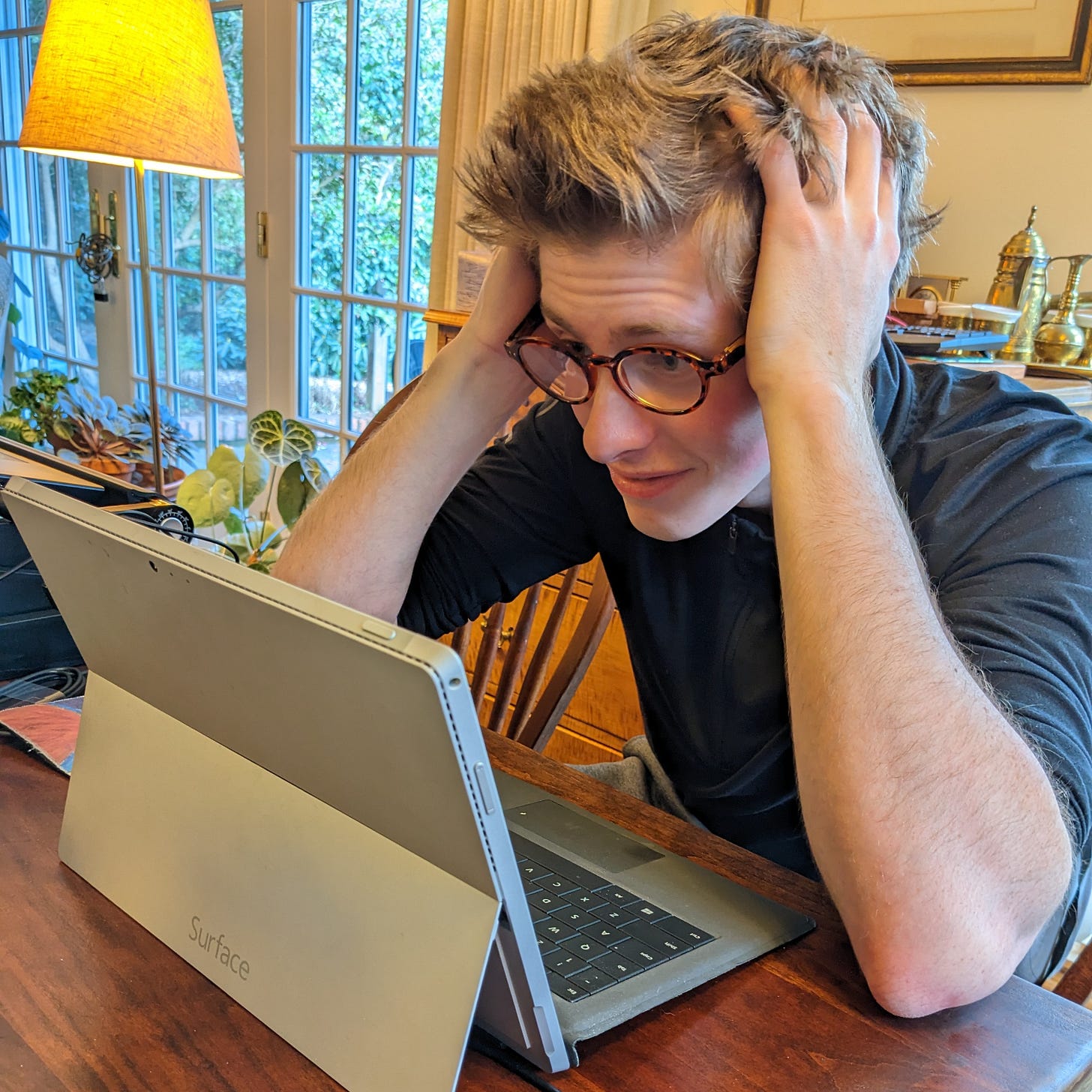 Frustrated writer staring at computer Frustrated writer staring at computer