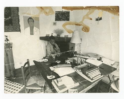 Image for Photograph of James Baldwin seated at his work table | James baldwin, Baldwin, Black ...